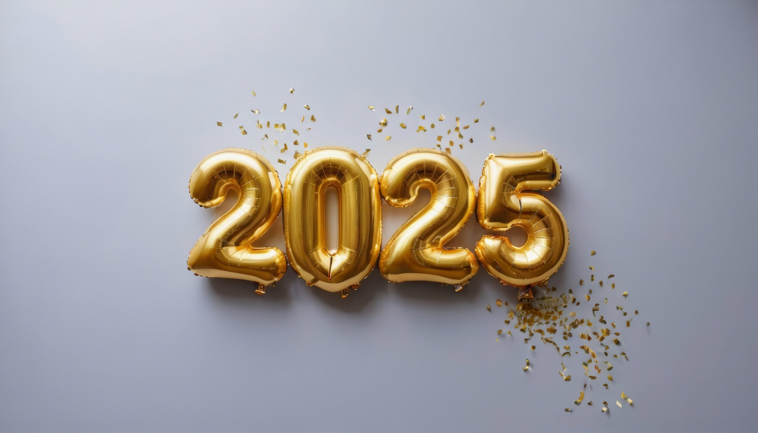 Gold balloons spelling out 2025